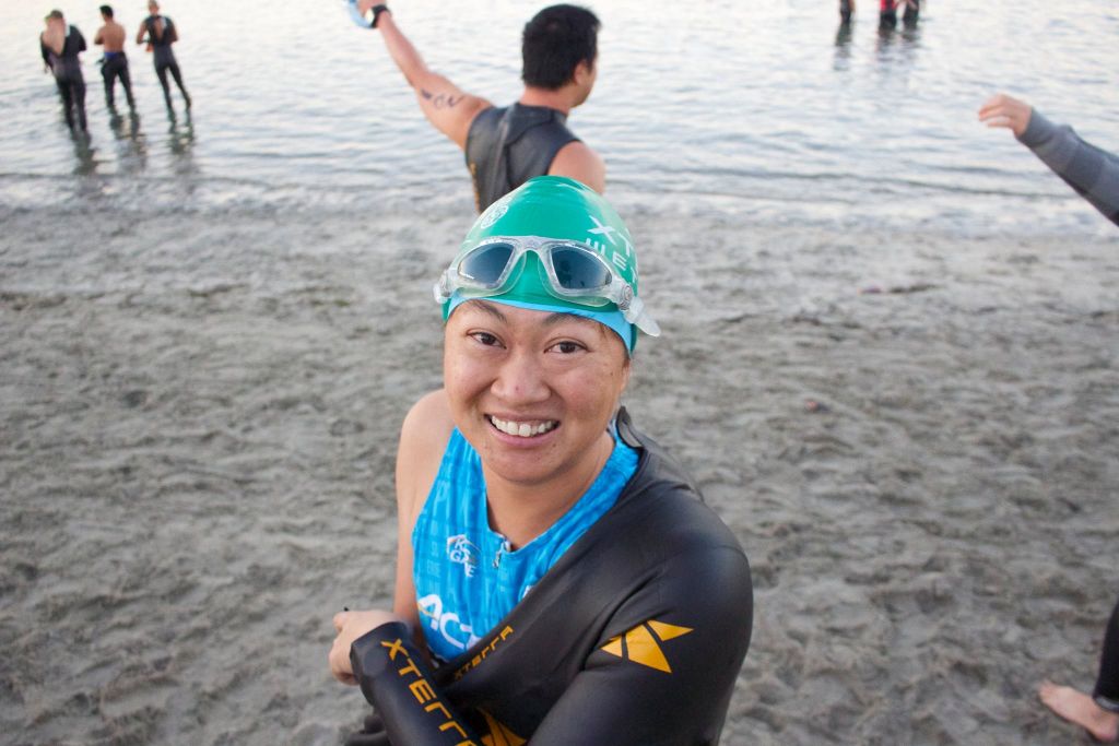 putting on wetsuit